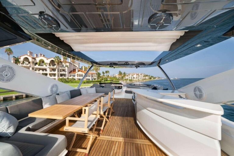 OASIS flybridge dining under the retractable hardtop, yacht charter Cannes