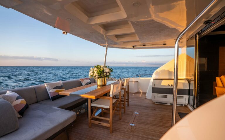 OMNIA aft deck alfresco dining at sunset, yacht charter Saint Tropez