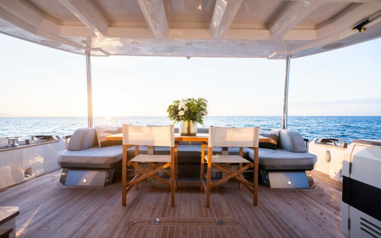 OMNIA aft deck dining with sea view, yacht charter French Riviera