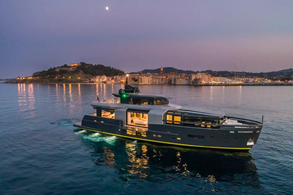 SEA CORAL II — evening view with lit interiors, charter Cote d Azur