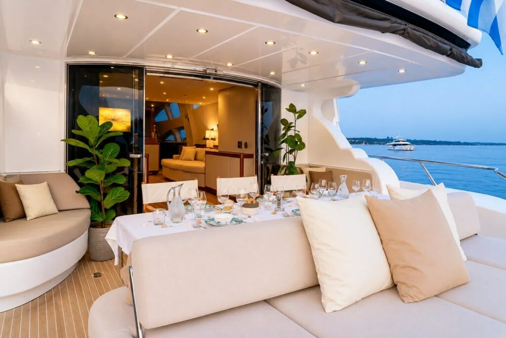 RAMSES II — main aft deck dining table set for lunch, charter Côte d'Azur